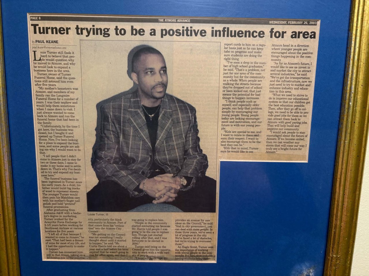 Framed newspaper clipping from The Atmore Advance, February 2003, headlined “Turner trying to be a positive influence for area.”